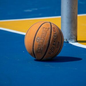 a close up of a basketball on a court